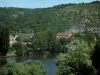 Cahors - The River Lot, trees, buildings, bell tower of the Sacré-Coeur church and hill, in the Quercy