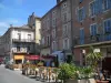 Cahors - Café terrace and houses of the city, in the Quercy