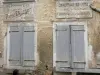 Châteauvillain - Vecchia insegna che adornano la facciata casa