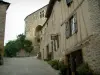 Cordes-sur-Ciel - Abfallende gepflasterte Strasse und ihre Häuser aus Stein