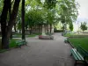 Embrun - Archevêché garden (paths, benches, trees, lawns, flowers) with Clovis Hugues's statue
