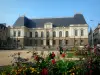 Rennes - Old town: Parlement de Bretagne palace, square, flowers in foreground