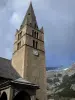 Валлуиз - Колокольня и крыльцо церкви Сент-Этьен, гора; в национальном парке Экрин