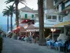 Кальви - Прогулка с пальмами, террасами ресторанов и домами морских