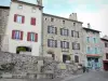 Allègre - Fountain and facades of houses in the small town of character