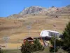L'Alpe d'Huez - Winter and summer sports resort (ski resort): lift of the ski area in autumn