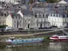 Angers - Maine river with barges (boats), quay, houses and buildings of the city