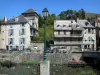 Arreau - Tower of château Ségure, lamppost and houses of the village along the river; in the Bigorre area