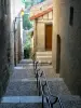 Auch - Pousterle de las Oumettos (escalera de carril bordeada de casas)