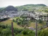 Auvergne Volcanic Regional Nature Park - Panorama of the town of Murat and the basaltic hillock of Bonnevie from the rock of Bredons