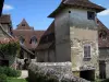 Carennac - Tower and houses of the village, in the Quercy