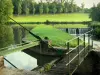 Castillo y molino de Thévalles - Alcanzar el molino de agua, en la ciudad de Chémeré-le-Roi