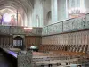 La Chaise-Dieu Abbey - Inside the Saint-Robert abbey church: stalls and tapestries of the choir