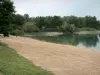 Chalain lake - Sandy beach, lake and trees