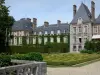 Château de Courances - Part of the château, outbuildings and box tree broderie of the French-style formal garden