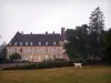 Château de Drée - Facade of the Château, trees, cow in a meadow; in Curbigny