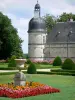 Château de Valençay - Corner tower of the château and flowerbeds (flowers) of the formal gardens