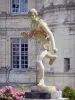 Château de Valençay - Sculpture (statue), flowers and facade of the château