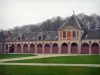 Château de Vaux-le-Vicomte - Outbuildings made of brick and stone, and alleys lined with lawns
