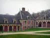 Château de Vaux-le-Vicomte - Outbuildings made of brick and stone, and alleys lined with lawns