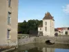 Commarin castle - Square towers and bridge spanning the moat