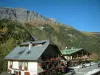 Les Contamines-Montjoie - Chalets of the village (ski resort) and the forest in autumn