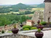 Curemonte - Jardín de una casa en el pueblo con vistas al paisaje de los alrededores