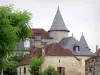 Curemonte - Fachadas de casas en el pueblo medieval