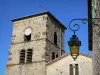 Désaignes - Campanario románico de la iglesia y la linterna de la pared
