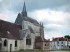 Exmes - Saint-André church and houses of the village