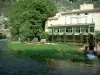 Fontaine-de-Vaucluse - The River Sorgue, a hotel and trees