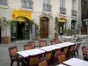 Forcalquier - Facade and café terraces of the Saint-Michel square