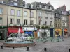 Fougères - Aristide-Briand square: fountain, shops and houses