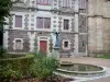 Fougères - Public garden with a lake, a statue and a building
