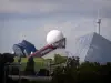 Futuroscope theme park - Buildings in the futuristic architecture: Omnimax in foreground, Futuroscope pavilion (white sphere and glass prism), and Kinemax in background