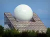 Futuroscope theme park - White sphere and glass prism of the Futuroscope pavilion (building with a futuristic architecture)
