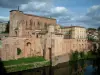 Gaillac - The River Tarn, the Saint-Michel abbey (abbatial buildings home to the Abbey museum and the Wines House), abbey church, houses of the city and the clouds in the sky