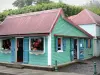 Hell-Bourg - Colorful house houses a shop