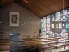 Hem chapel - Inside of the Sainte-Thérèse-de-l'Enfant-Jésus-et-de-la-Sainte-Face chapel with the stained glass windows of Manessier