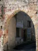 Hérisson - Porte de Gateuil gate and facade of a house in the medieval village