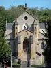 Hérisson - Facade of the Notre-Dame church of Neo-Gothic style with its horseshoe staircase