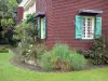 Jardin botanique de la Réunion - Mansión criolla y sus plantas en flor