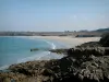 Landscapes of the Brittany coast - Rocks and magnificent sandy beach, then coast far off