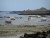 Landscapes of the Brittany coast - Low tide with small boats and trawlers, seaweeds, coasts and rocks, then sea