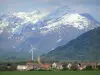 Landscapes of Dauphiné - Trièves: village, wind, pasture, forest and snow-capped mountains