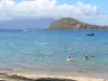 Landscapes of the Guadeloupe - Les Saintes islands: beach of the Devant cove overlooking the sea, the Cabrit islet and the island of Basse-Terre in the background