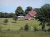 Landscapes of the Orne - Farm surrounded by meadows and trees