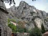 Lanscapes of Alpes-de-Haute-Provence - Cliff (rock faces) overlooking the houses of the Moustiers-Sainte-Marie village; in the Verdon Regional Nature Park