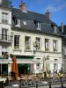 Laon - Cafe terrace and facades of houses on the Parvis Gautier de Mortagne square
