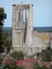 Larchant church - Tower of the Saint-Mathurin church, rooftops of the village and trees